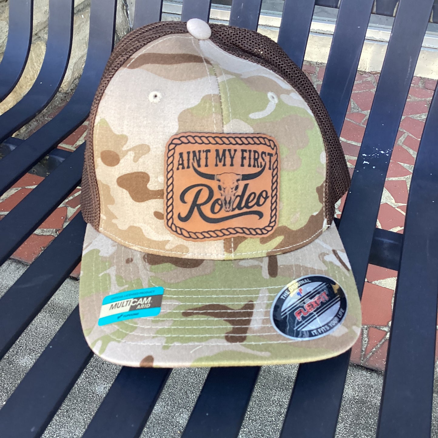 MultiCam Arid Trucker Hat with "Ain't My First Rodeo" Leather Patch