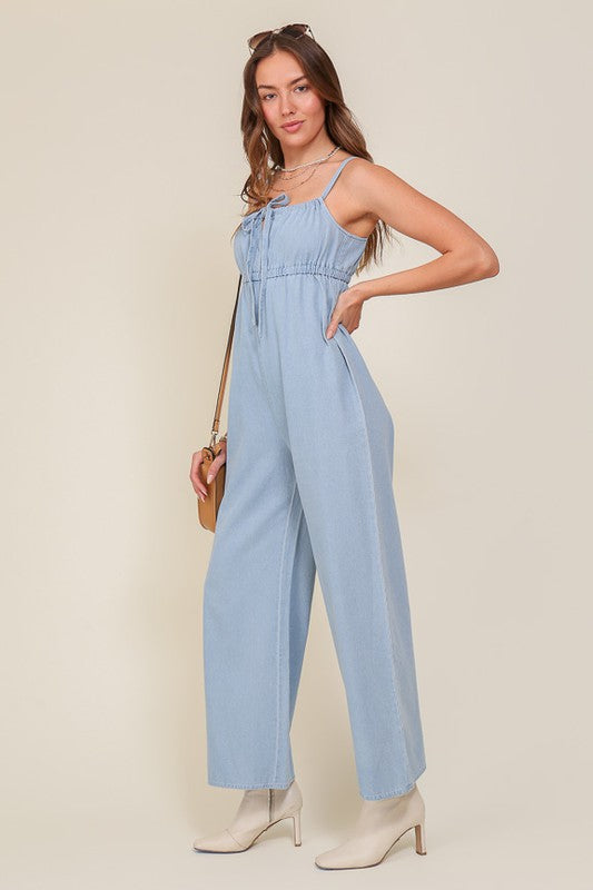 Denim blue sleeveless jumpsuit with self front Tie
