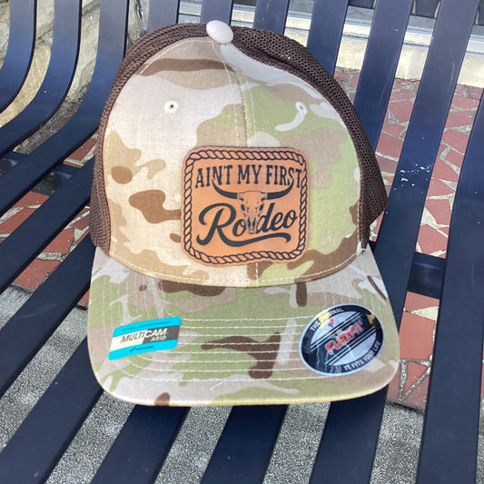 MultiCam Arid Trucker Hat with "Ain't My First Rodeo" Leather Patch